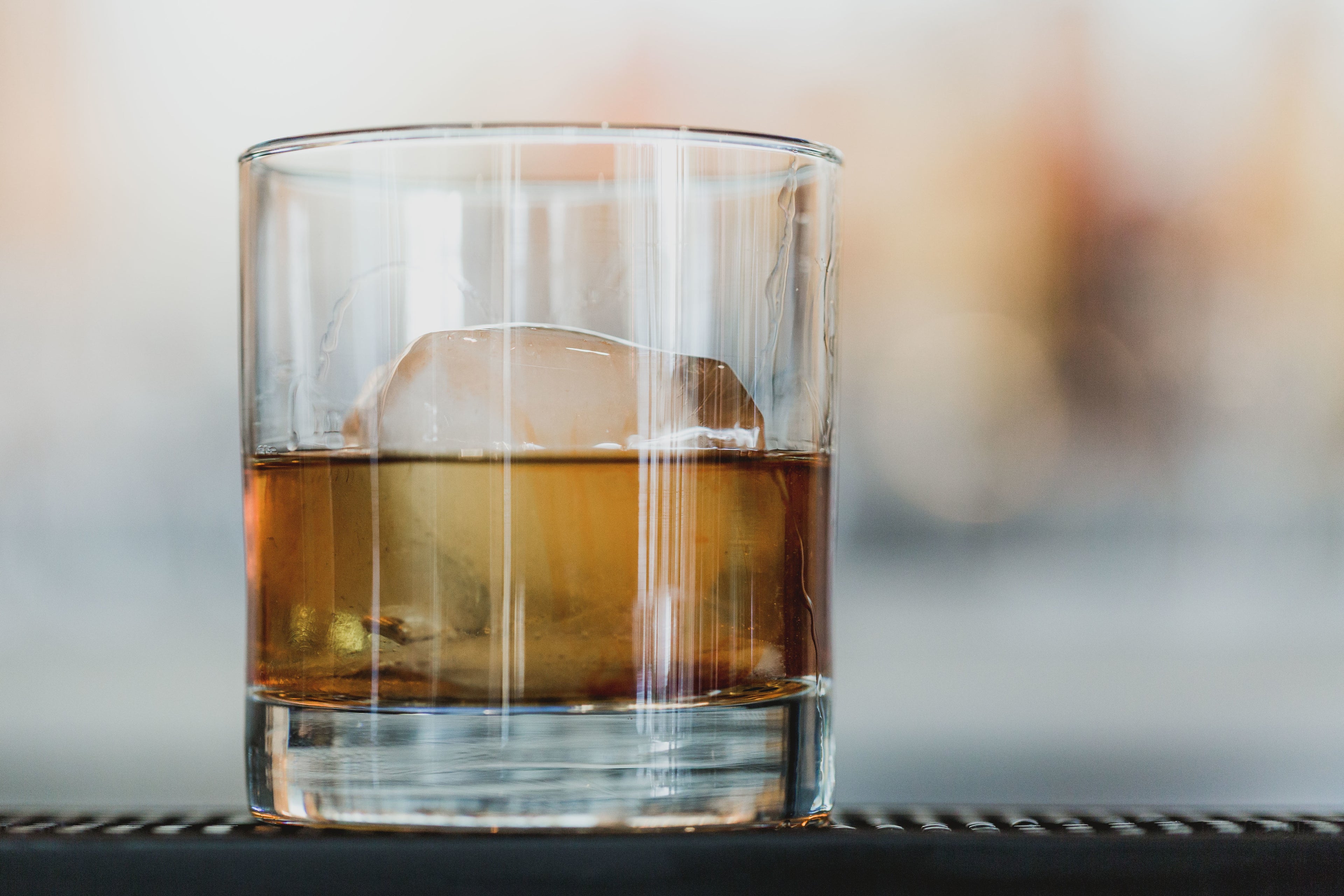 Glass of whiskey with ice
